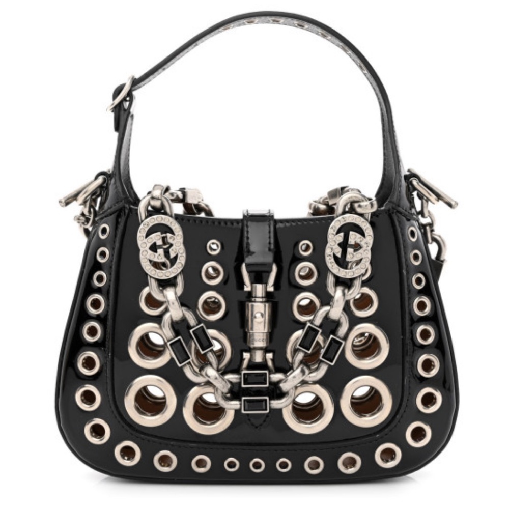 This is an authentic GUCCI Patent  Ha Ha Ha Jackie 1961 Eyelet Hobo.